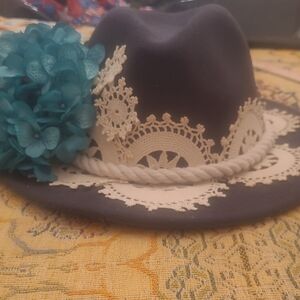 Elegant Black and Blue Hat with Lace and Floral Accents